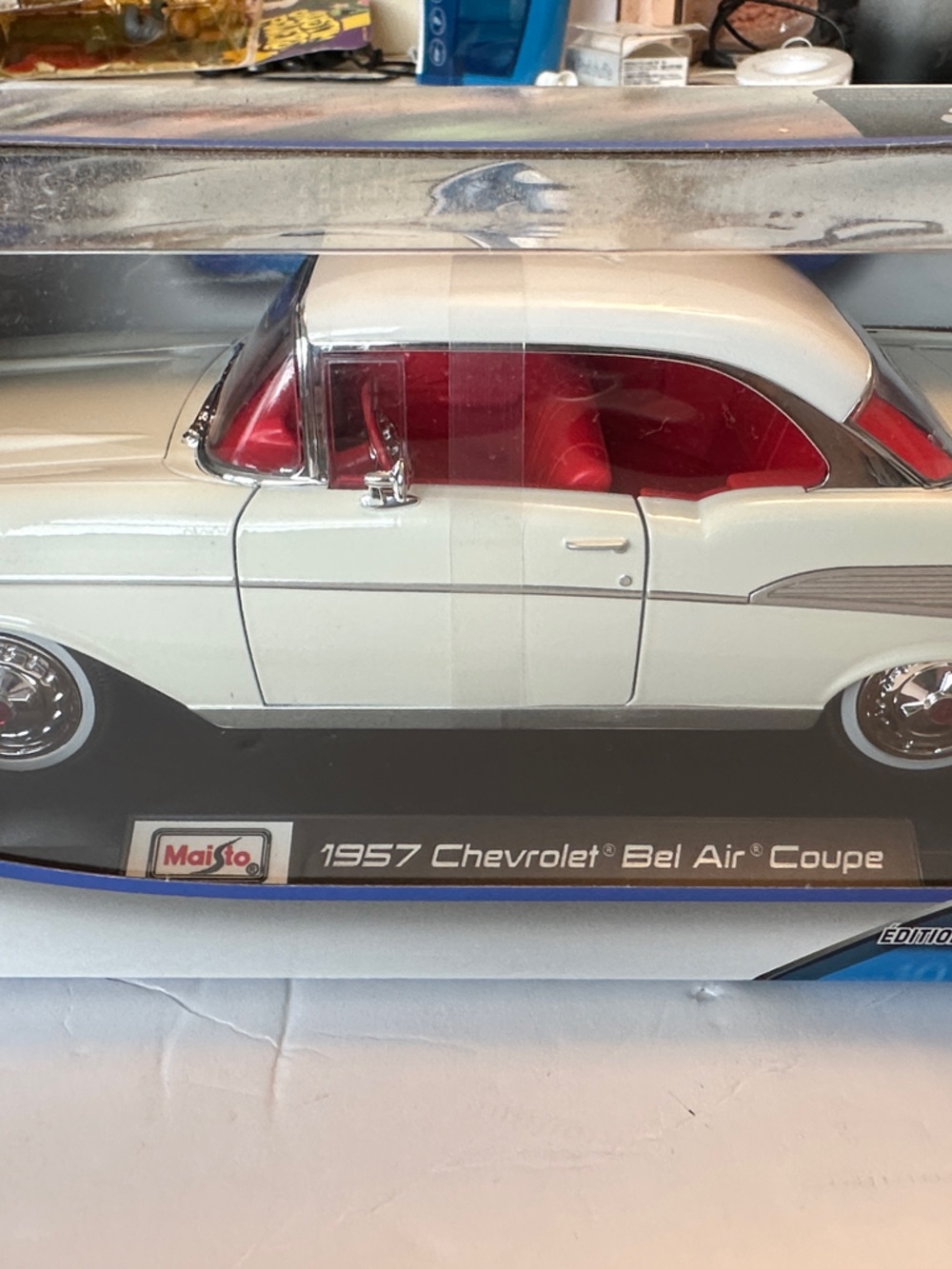 Maisto 1957 Chevrolet Bel Air Coupe Die-Cast Model in White with Red Interior